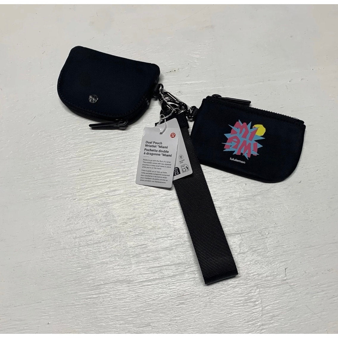 Exclusive Lululemon × Miami Collab Dual
Pouch Wristlet Black Rare Piece NWT